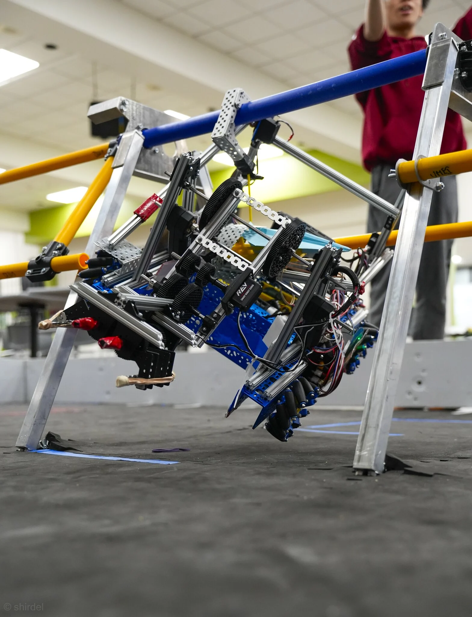 Victoria Park Robotics robot hanging from a test frame in the workshop
